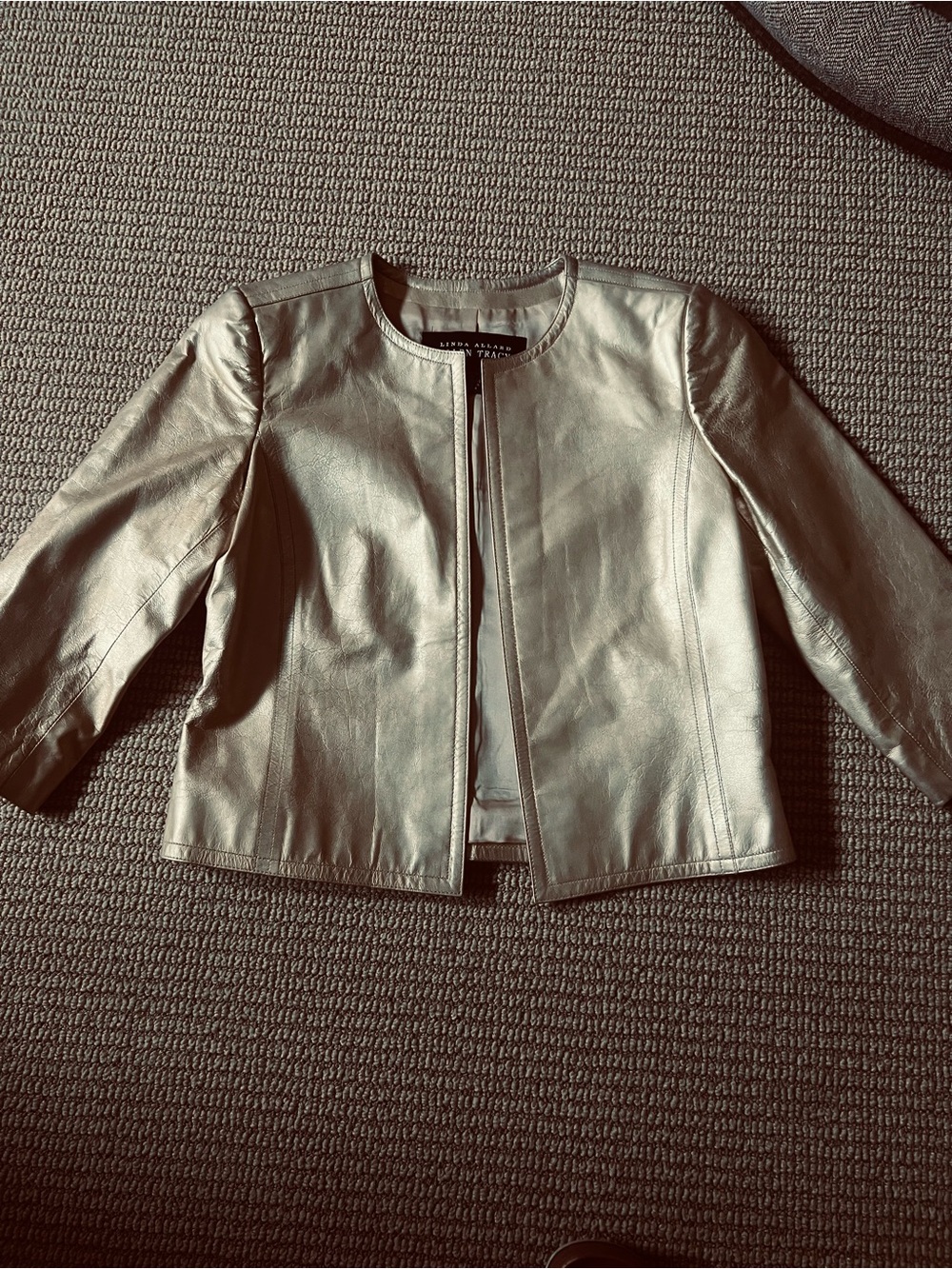 Designer Gold Leather cropped blazer with cropped sleeves.
